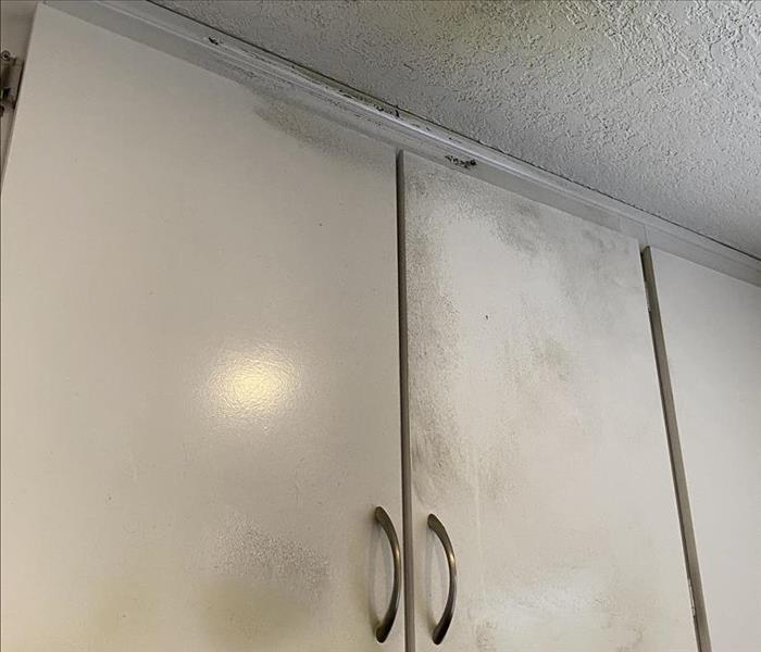 Fire and smoke damaged kitchen cabinets