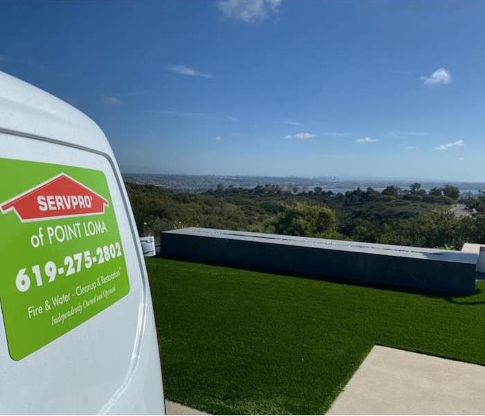 white SERVPRO van in front of San Diego view